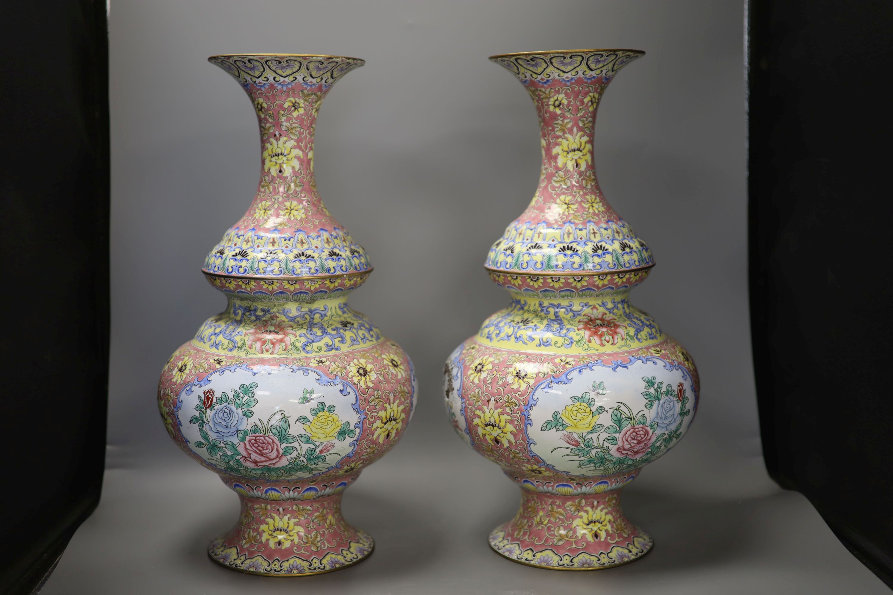 A pair of Chinese canton enamel vases, height 47cm